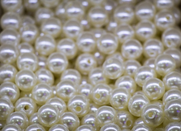 Pearl beads background with many shiny pearls