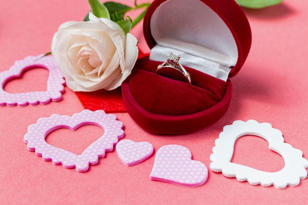 Pearl ring in heart shaped box and flower. Valentine's Day gift