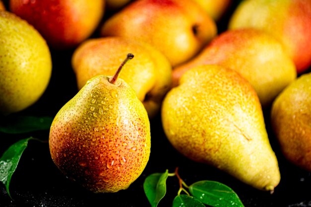 Pears fresh on a black background