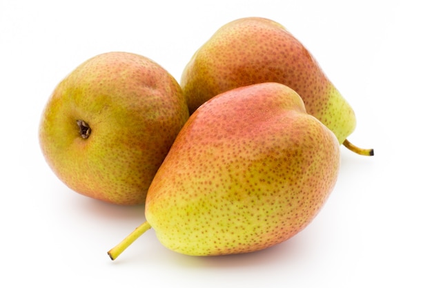 Pears isolated on the white table.