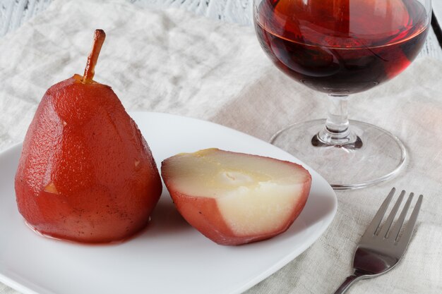 Photo pears poached in red wine sauce