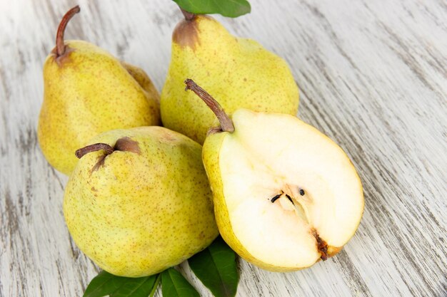 Pears on wooden background