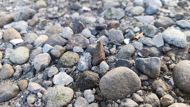 Pebbles on beach with warm glow