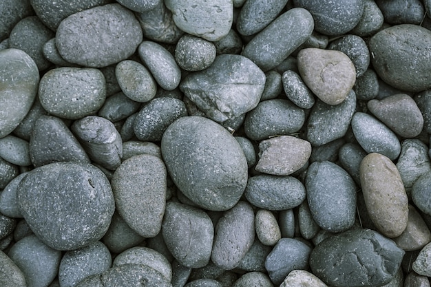 Pebbles stone background with vintage filter