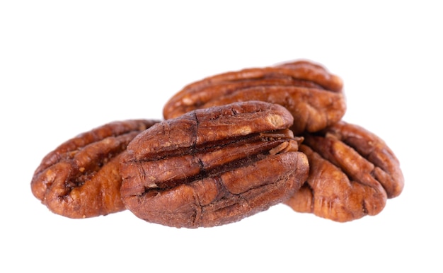 Pecan nuts isolated on white background Shelled pecan Clipping path
