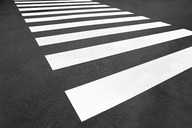 Pedestrian crossing on empty city street closeup