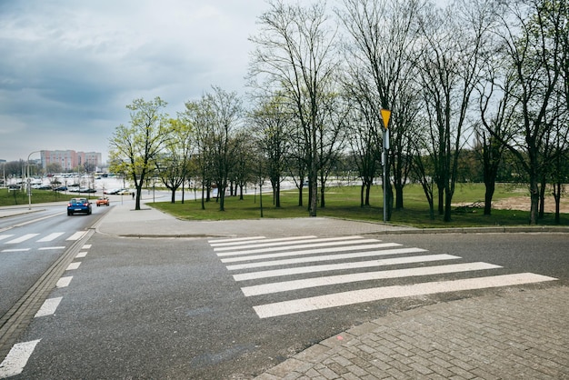 Pedestrian crossing at the intersection of three roads