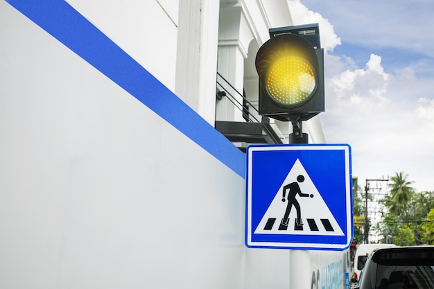 Pedestrian crossing sign on the street place for text