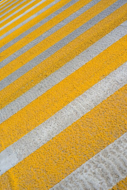 Pedestrian crossing with yellow stripes