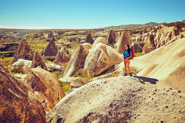 Pedestrian tourism, people travel with backpacks, in the open air.