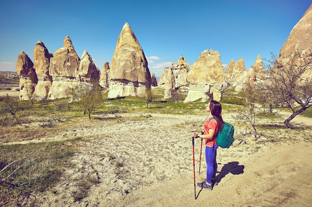 Pedestrian tourism, people travel with backpacks, in the open air.