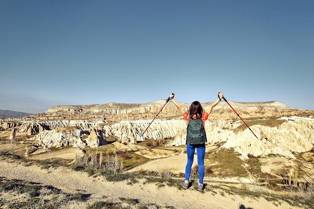 Pedestrian tourism, people travel with backpacks, in the open air.