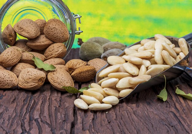 Peeled almonds, with peel and with skin.