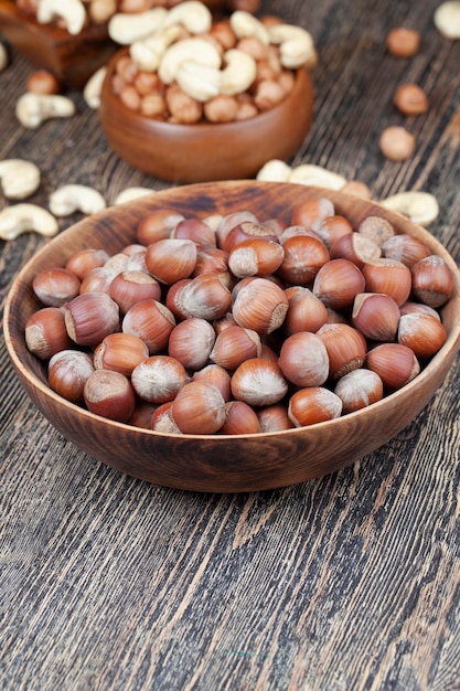 Peeled hazelnut nuts closeup on the table peeled from the hard shell of useful hazelnuts