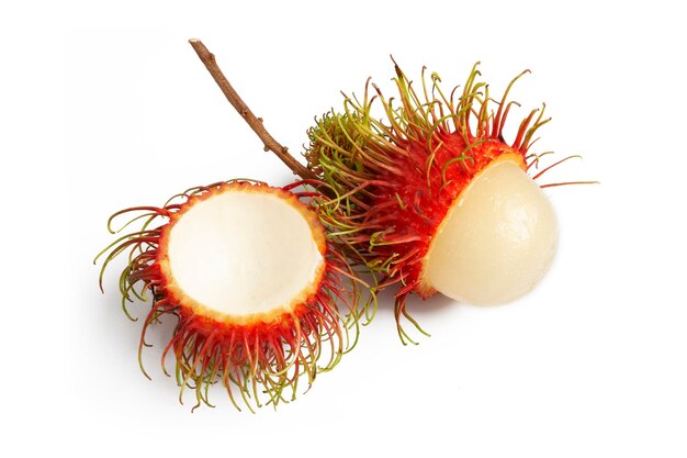 A peeled organic Rambutan popular Thai fruit on white background