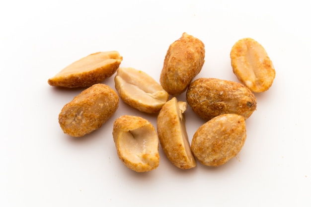 Peeled peanuts on the isolated background.