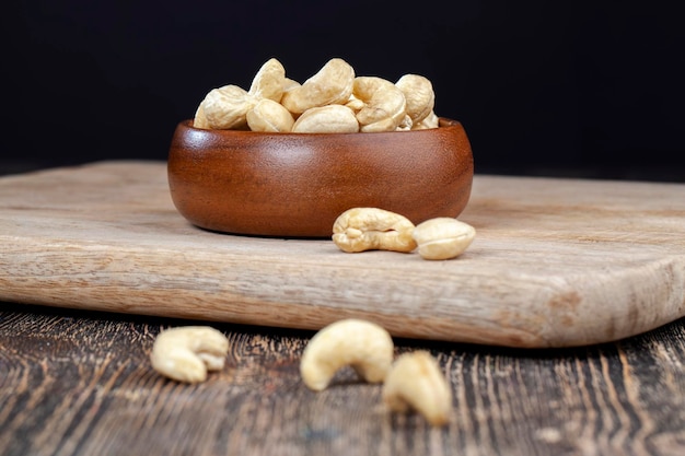 Peeled raw cashew nuts on the table