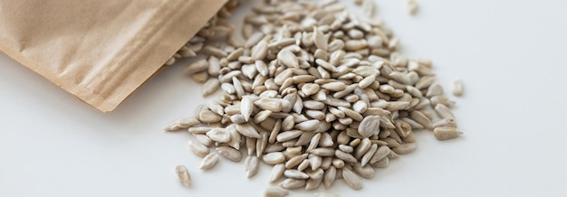 Peeled sunflower seeds isolated on white background with clipping path