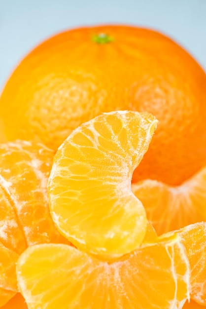 Peeled tangerine fruit segments in a photo taken very closely macro photo