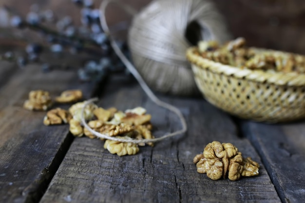 Peeled walnut on a wooden background