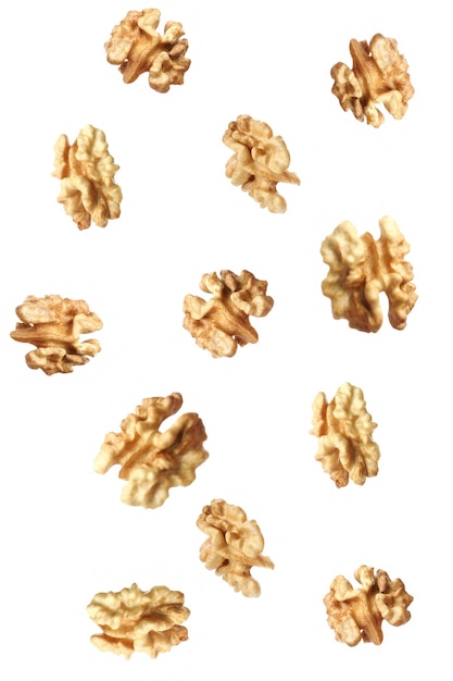 Photo peeled walnuts isolated on white background, close up