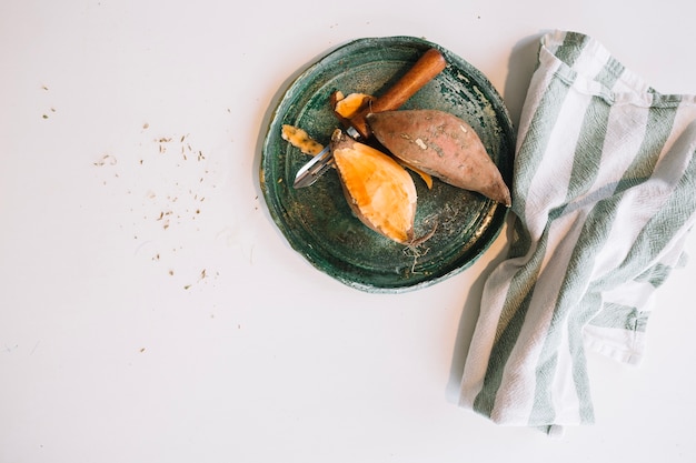 Peeled yam near cloth