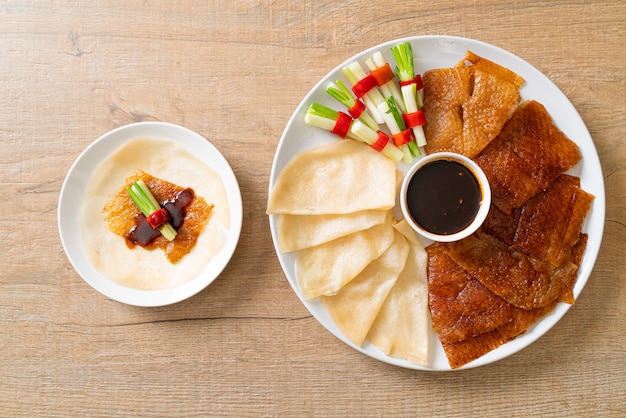 Peking duck with sauce and ingredients