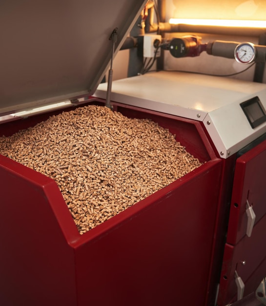 Pellet boiler system Biomass heating systems generate heat from biomass Renewable energy and sustainable future