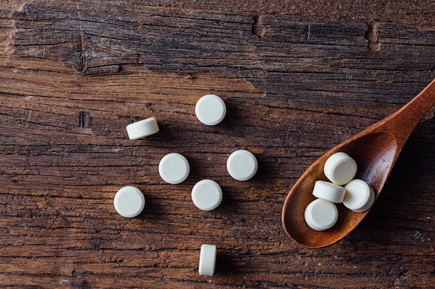 Pelleted milk on wooden table