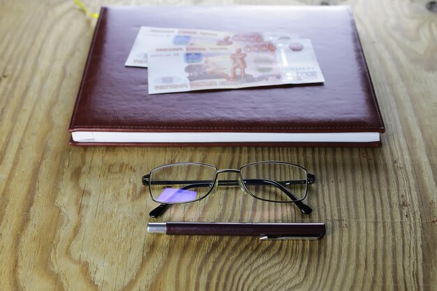 Pen business wallet glasses notebook