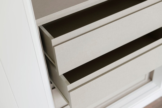 Premium Photo | Pen drawers of a built-in closet