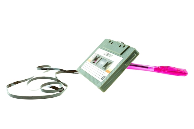 A pen pink and cassette tape compact  retro on white background