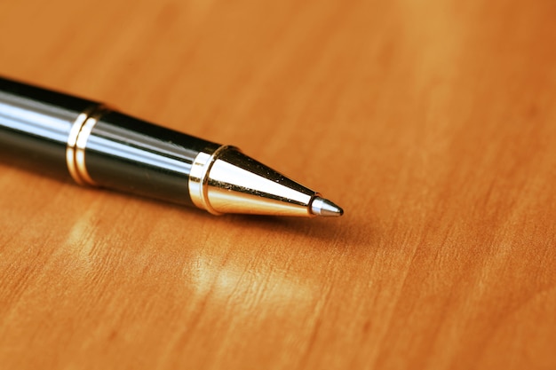 Premium Photo Pen On The Table premium-photo-pen-on-the-table