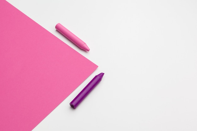 Pencil crayon on a bright pink 