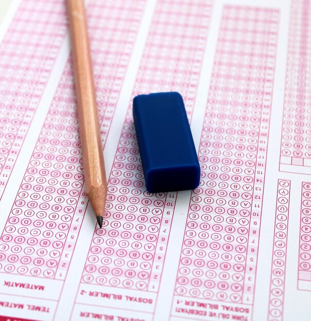 Pencil and eraser on the optical form Multiple choice exams