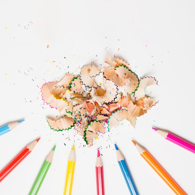 Pencil shavings on white background flat lay