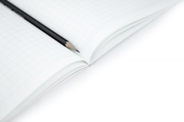 Pencil with blank notebook on isolated white for learning Japanese language writing words.