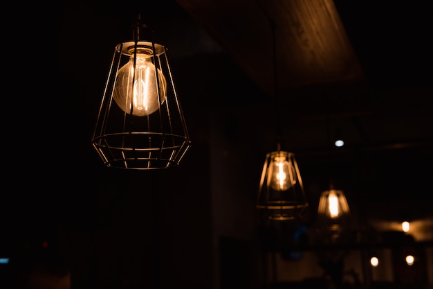 Pendant burning lamps glowing in the dark