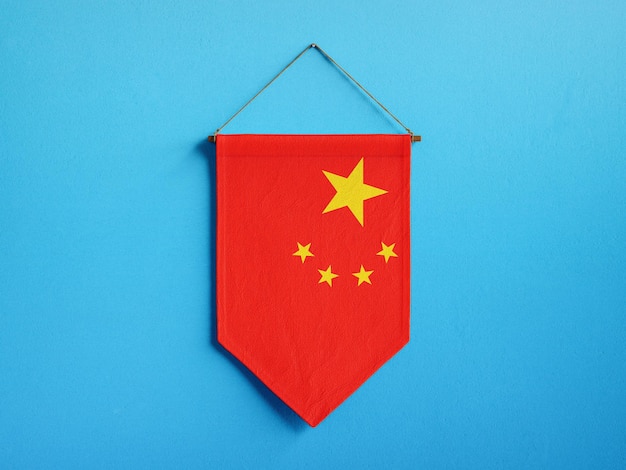 藍色背景上掛著中國國旗的旗<unk> 中國三角國旗掛著