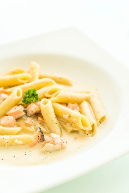 Penne carbonara pasta with salmon