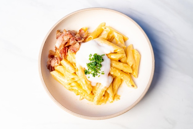 Penne pasta carbonara bacon with egg