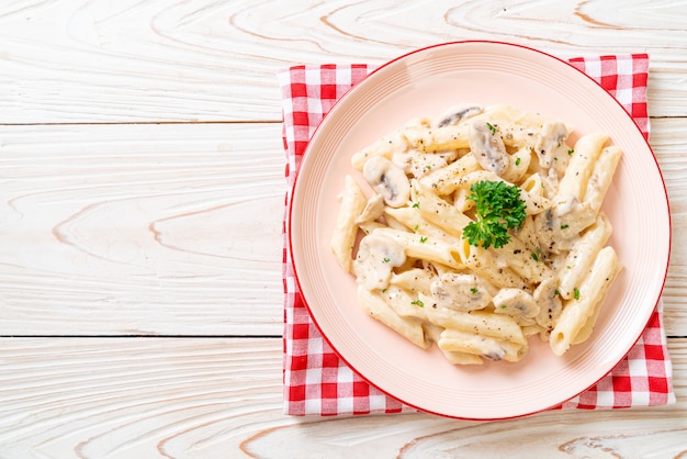 penne pasta carbonara cream sauce with mushroom