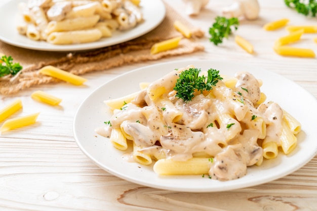 penne pasta carbonara cream sauce with mushroom