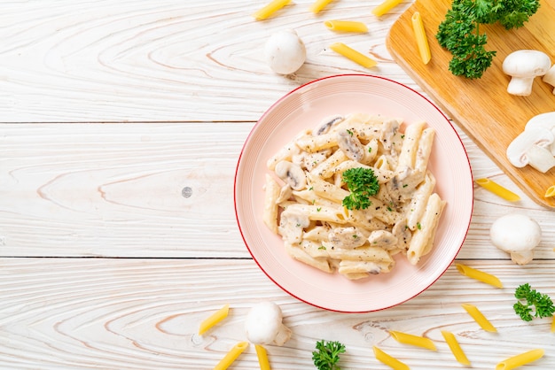 penne pasta carbonara cream sauce with mushroom