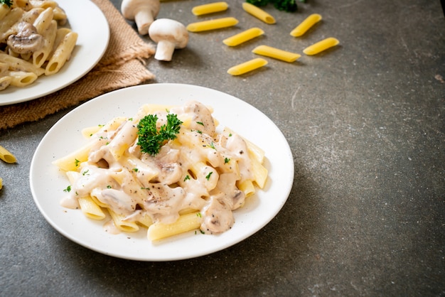 penne pasta carbonara cream sauce with mushroom