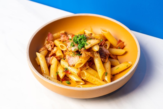 Penne pasta with garlic chili bacon