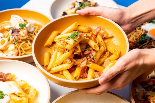 Penne pasta with garlic chili bacon