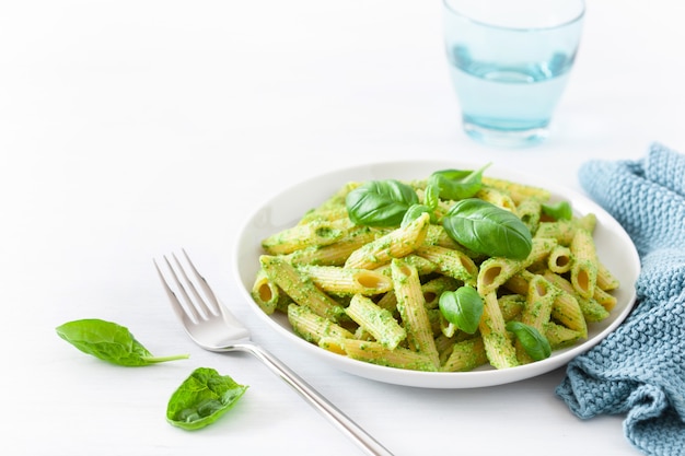 Penne pasta with spinach basil pesto sauce