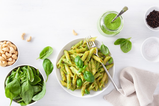 Penne pasta with spinach basil pesto sauce