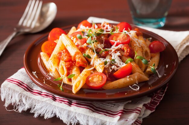 Penne pasta with tomatoes and parmesan